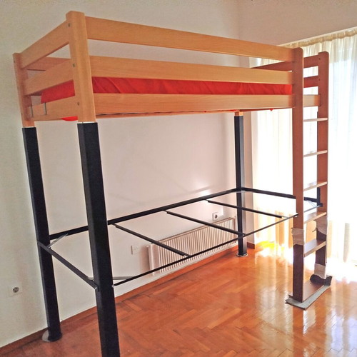 Wooden loft bed like new with metal frame and desk