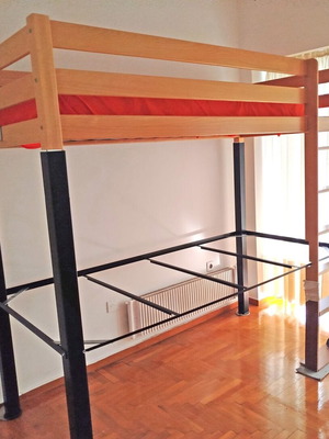 Wooden loft bed like new with metal frame and desk