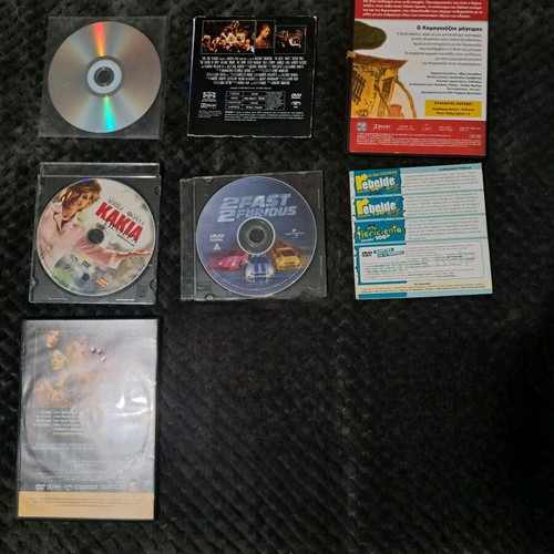 Pack of 8 DVDs used with minor scratches, playable