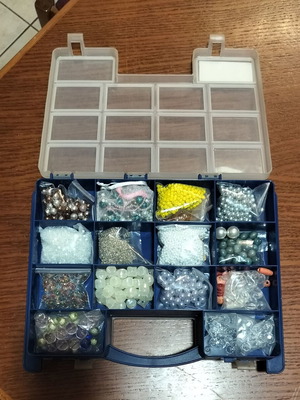 Beads in various sizes and colors in double-sided box like new