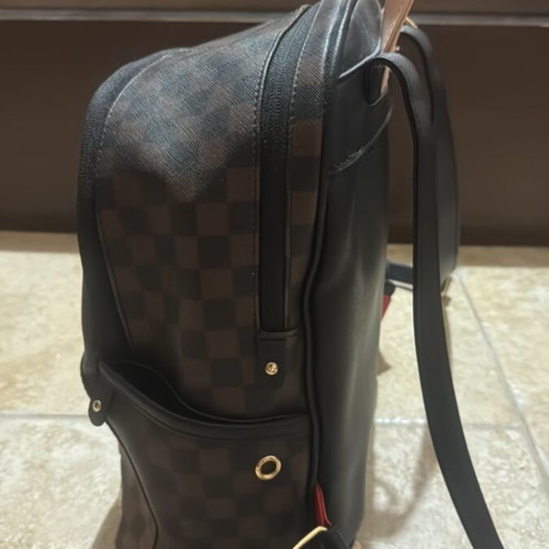 Sprayground backpack like new, brown and black