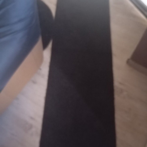 Black interior vintage runner rug used, minimalist design