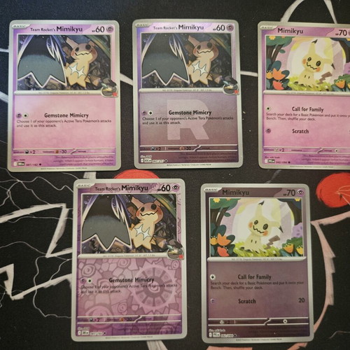 Lot of 5 Mimikyu Pokemon cards, common and reverse holo