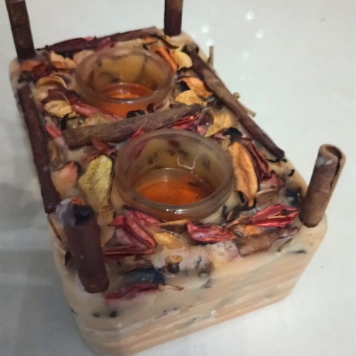Handmade rectangular candle with aromatic potpourri like new