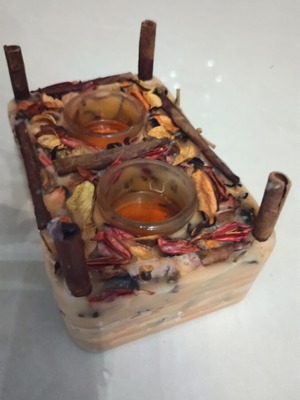 Handmade rectangular candle with aromatic potpourri like new