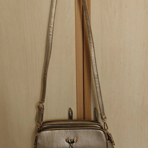 Shoulder bag in metallic gold color like new