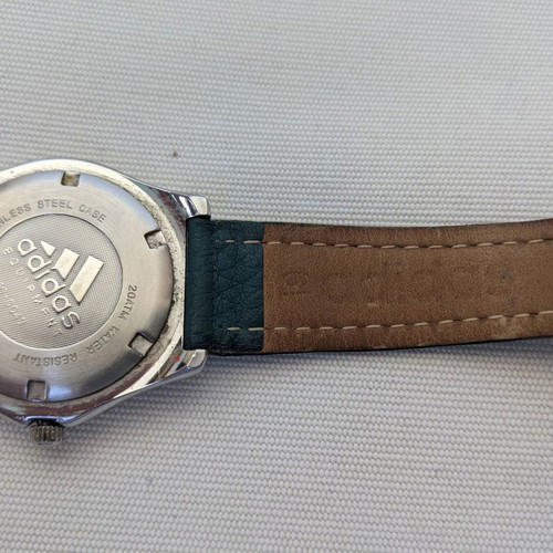 Adidas men's watch used with green leather strap