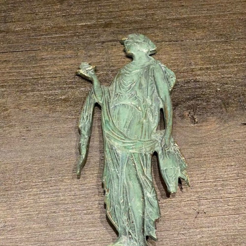 Decorative figurine of archaic/classical type used, bronze metal
