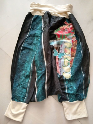 Handmade wide-leg pants with appliqué design, new