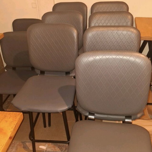 Chairs used for professional space with gray leatherette and black metal legs