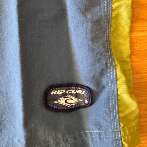 Rip Curl boardshort used, blue with green detail, size M