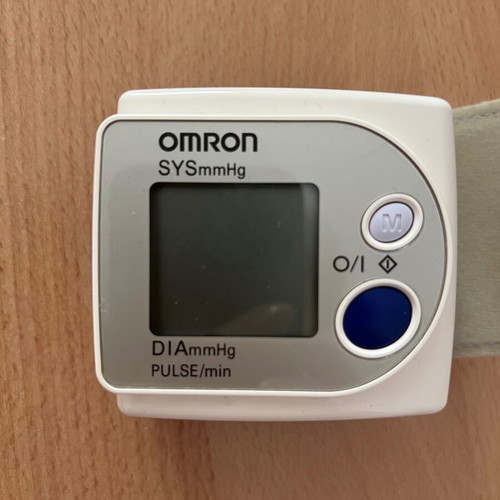 Omron digital wrist blood pressure monitor used