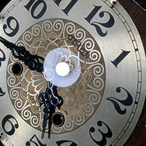 Vintage wooden wall clock with pendulum used, eagle decoration