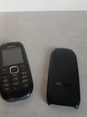Nokia mobile phone used, rusty contacts, no battery, unknown condition