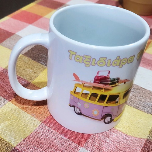 Coffee mugs used, set of 4 with designs and Nava brand