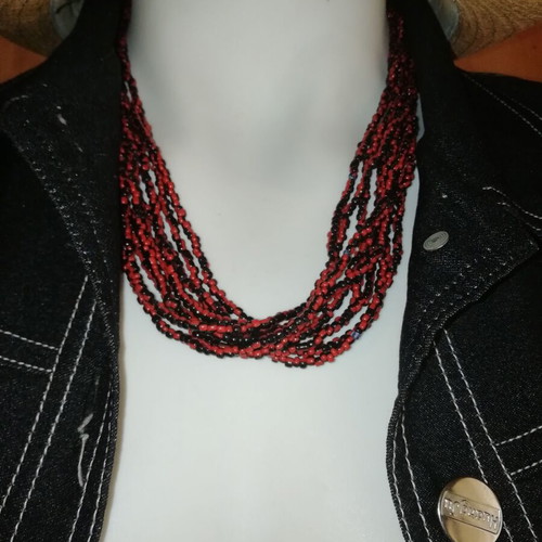 Boho style bronze necklace with small resin beads in burgundy and black