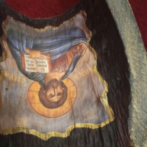 Christ image on tree trunk like new