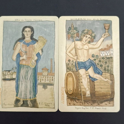 Pair of Theofilos collectible phone cards like new