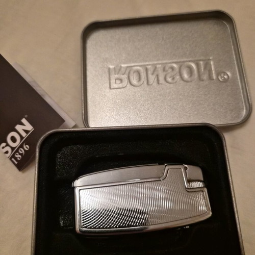 Ronson lighter like new with purchase tag