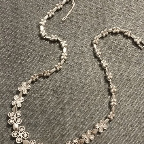 Riviera necklace with flower and four-leaf motifs, silver