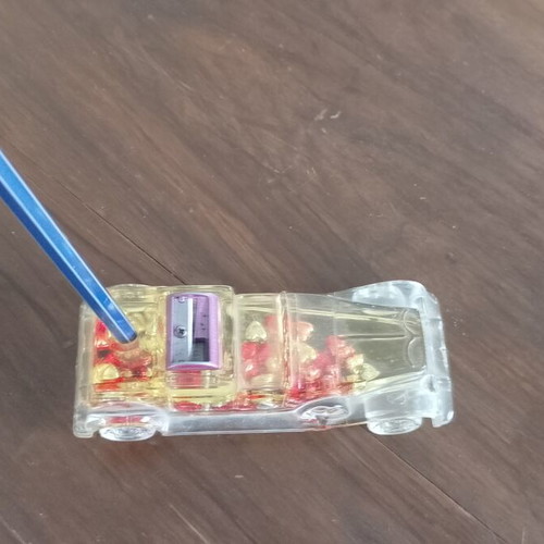 Vintage novelty pen holder used, car shaped with moving hearts