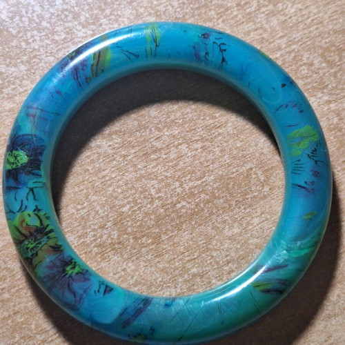 Petrol resin bracelet with flower designs like new