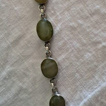 Silver bracelet with genuine green stones, like new