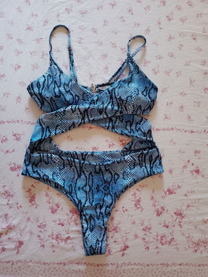 Women's swimsuit with crossed front design, animal print, size S, new