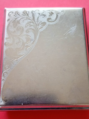 German vintage cigarette case used with embossed ornaments