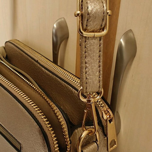 Shoulder bag in metallic gold color like new