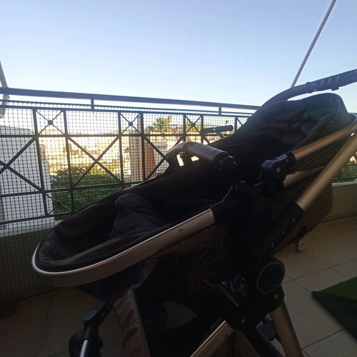 Multifunctional stroller used, foldable in two parts, beige brown gold