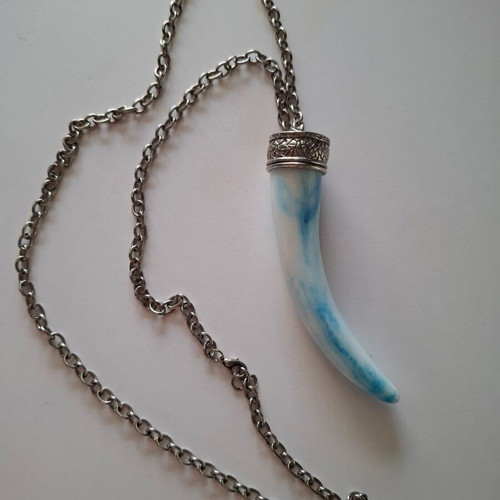 Long necklace used with elephant tooth design in white and turquoise