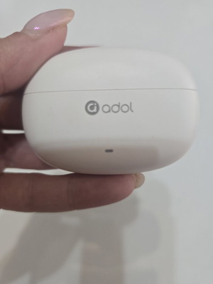Adol True Wireless Bluetooth earbuds used with charging case