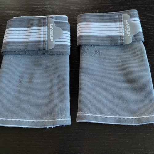 Liveup Sports elastic knee pads pair used with adjustable straps