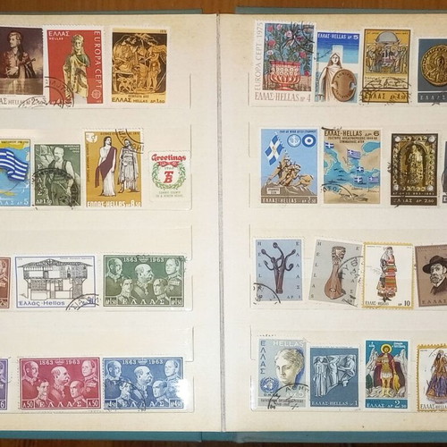 Book with collection of various Greek and foreign stamps used