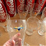  10 Ποτήρια CocaCola με αθλήματα Ολυμπιακών Αγώνων 2004 και τις μασκότ Φοίβο και Αθηνά και 6 σουβέρ!