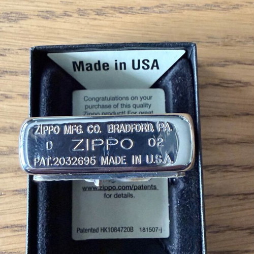 Zippo lighter with cross symbol like new