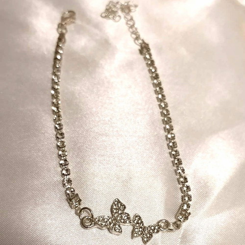 Bracelet with shiny butterflies new, white and silver