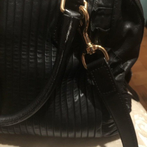 Dolce Gabbana shoulder bag used, black leather with leopard interior