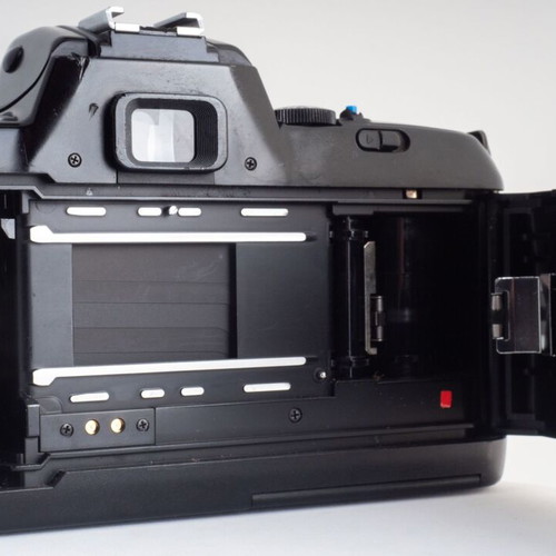 Nikon F-401X 35mm film camera with original leather strap