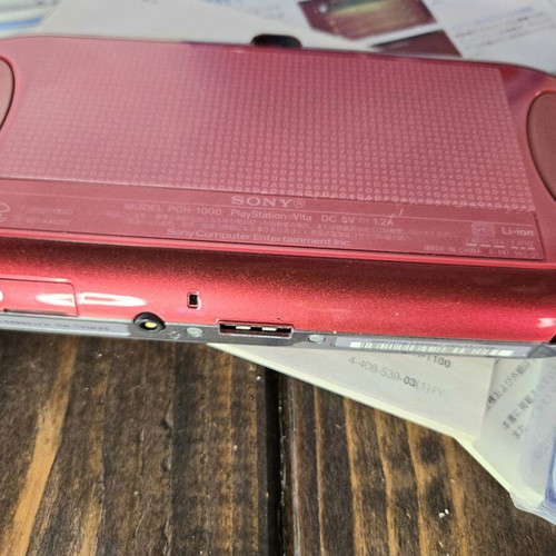 Sony PlayStation Vita PCH-1000 Cosmic Red console