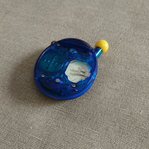 Bandai Tamagotchi Connection V4 used with star pattern blue case