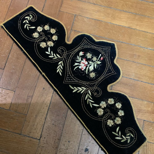 Traditional embroidery used, dark velvet