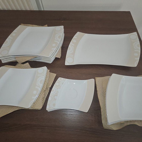 Hausmann porcelain dinnerware set like new, modern beige circles