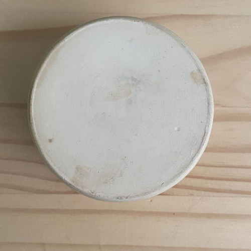 Small beige ceramic bowl used
