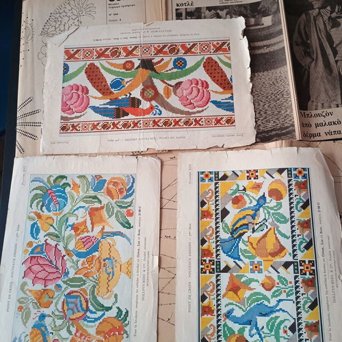 DMC and Burda embroidery patterns used, assorted