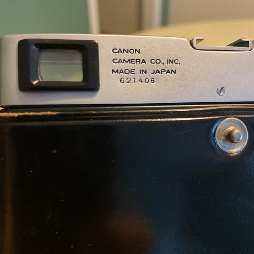 Canon Canonet vintage camera with 45mm f/1.9 lens and leather case like new