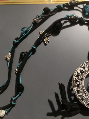 Boho pendant necklace new with metallic details and black blue beads