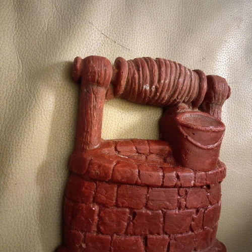 Decorative wall well used, red color