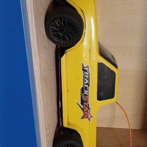 HPI gas-powered remote control car with spare parts
